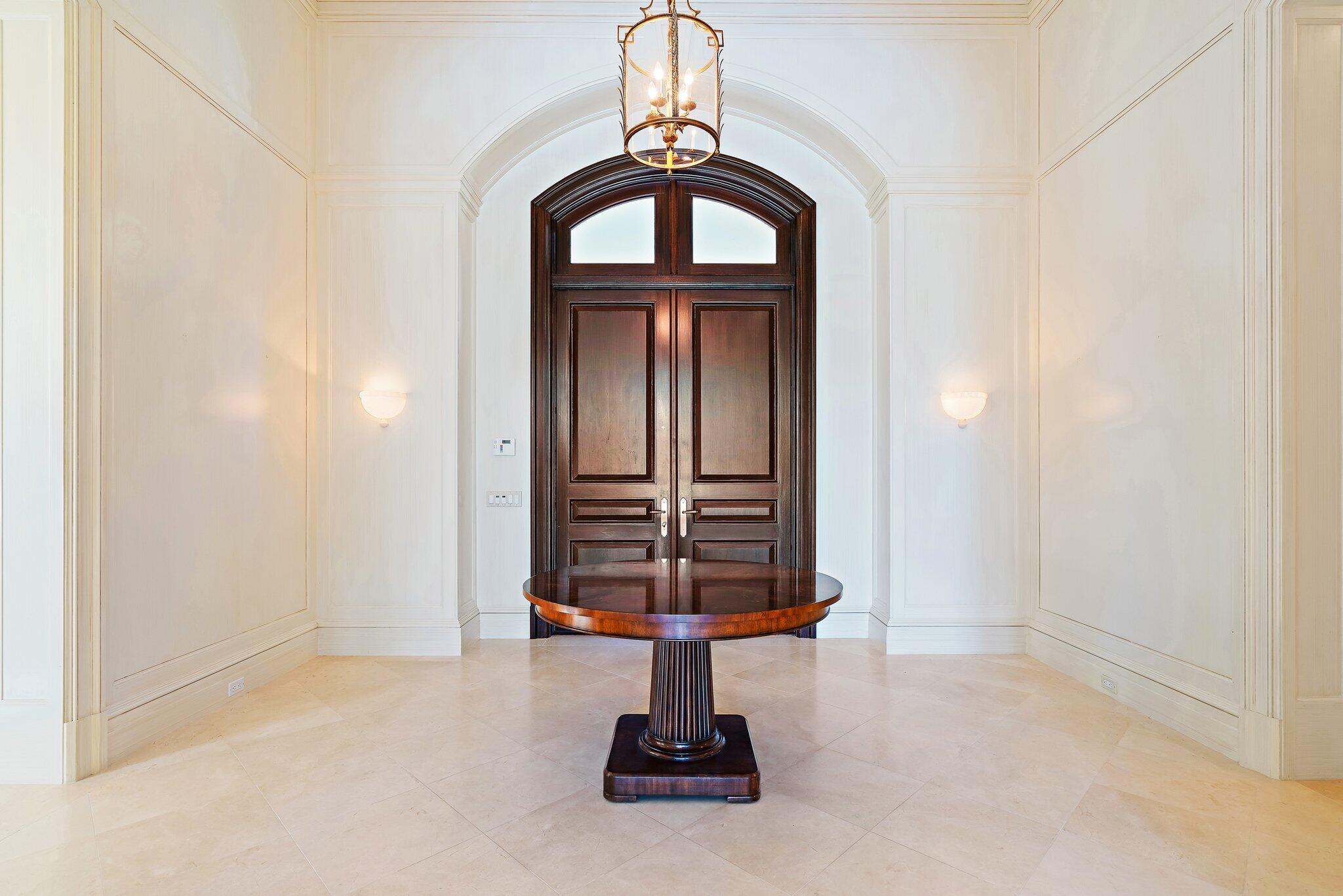 124 Bears Club Drive Jupiter, FL 33477 - Photo 23 of 75 a view of entryway with a front door