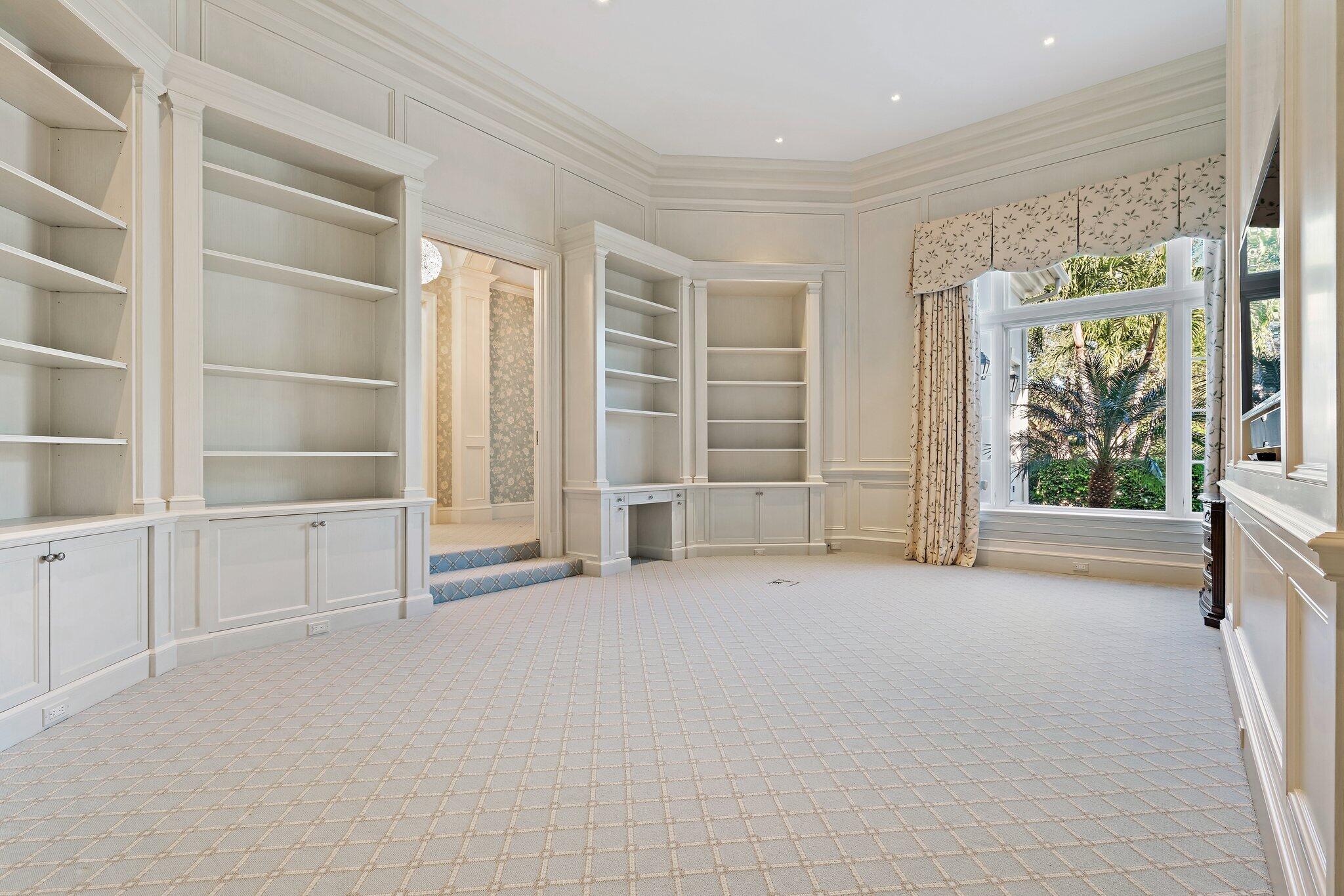 124 Bears Club Drive Jupiter, FL 33477 - Photo 27 of 75 an empty room with windows and pillars in it