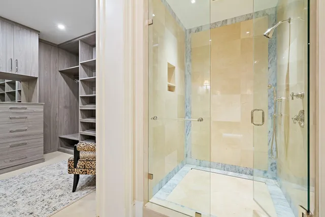 a kitchen with granite countertop a sink stove and cabinets