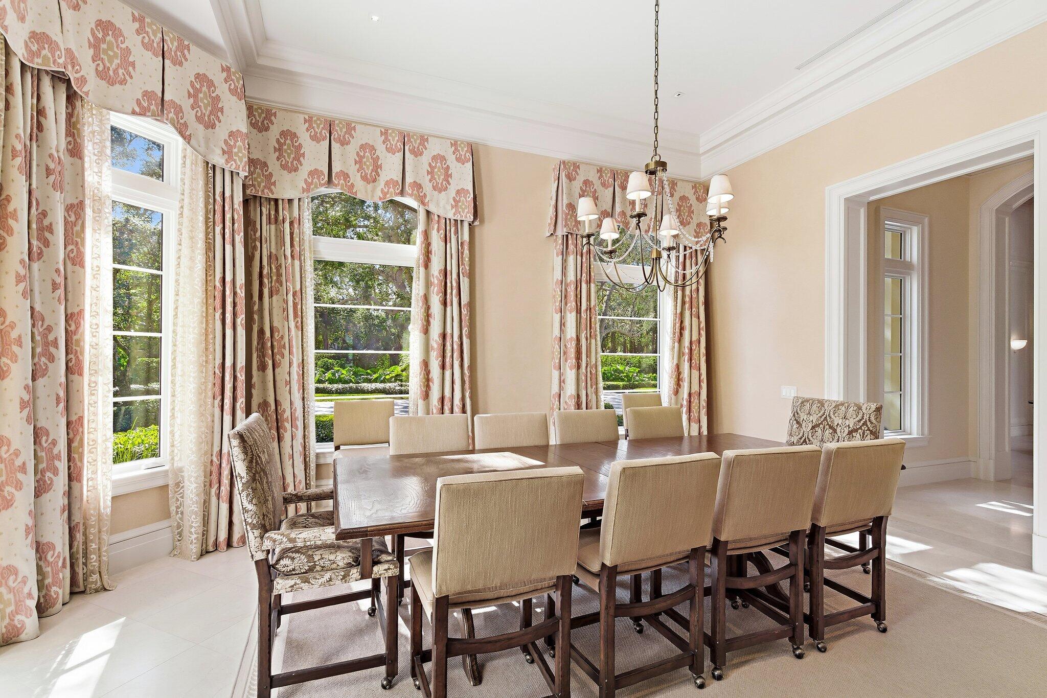 124 Bears Club Drive Jupiter, FL 33477 - Photo 47 of 75 a view of a dining room with furniture and windows