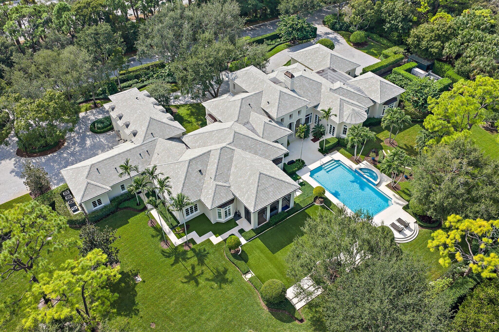 124 Bears Club Drive Jupiter, FL 33477 - Photo 7 of 22 an aerial view of residential houses with outdoor space