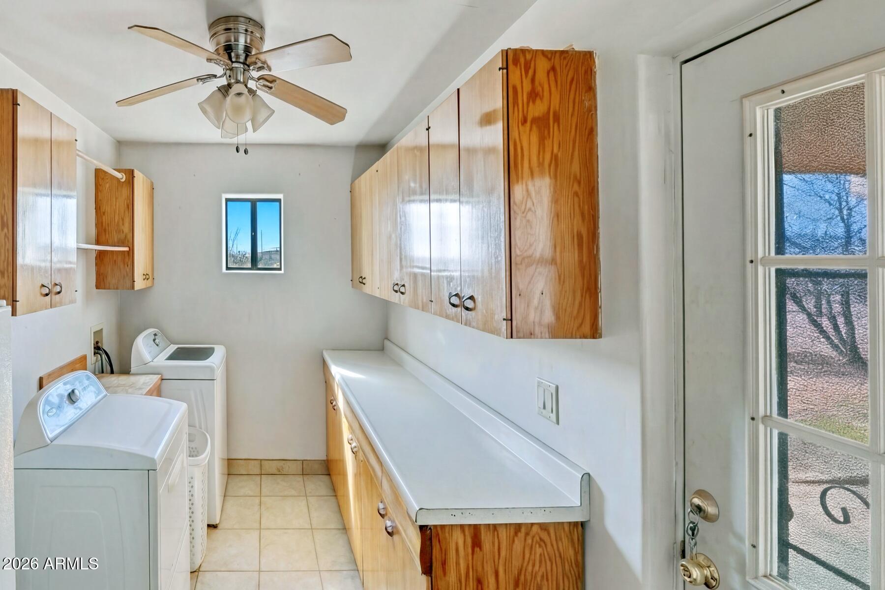 7027 North Bond Road McNeal, AZ 85617 - Photo 11 of 20 a bathroom with a sink a mirror and a shower