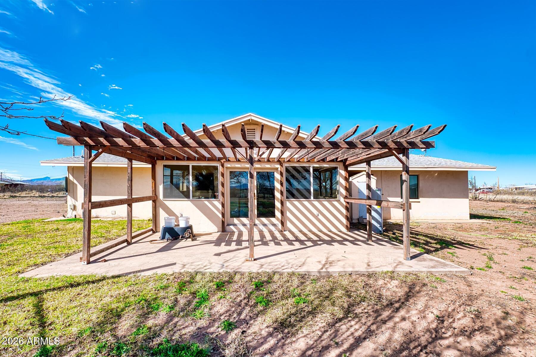 7027 North Bond Road McNeal, AZ 85617 - Photo 3 of 20 a view of a chairs and table in the patio