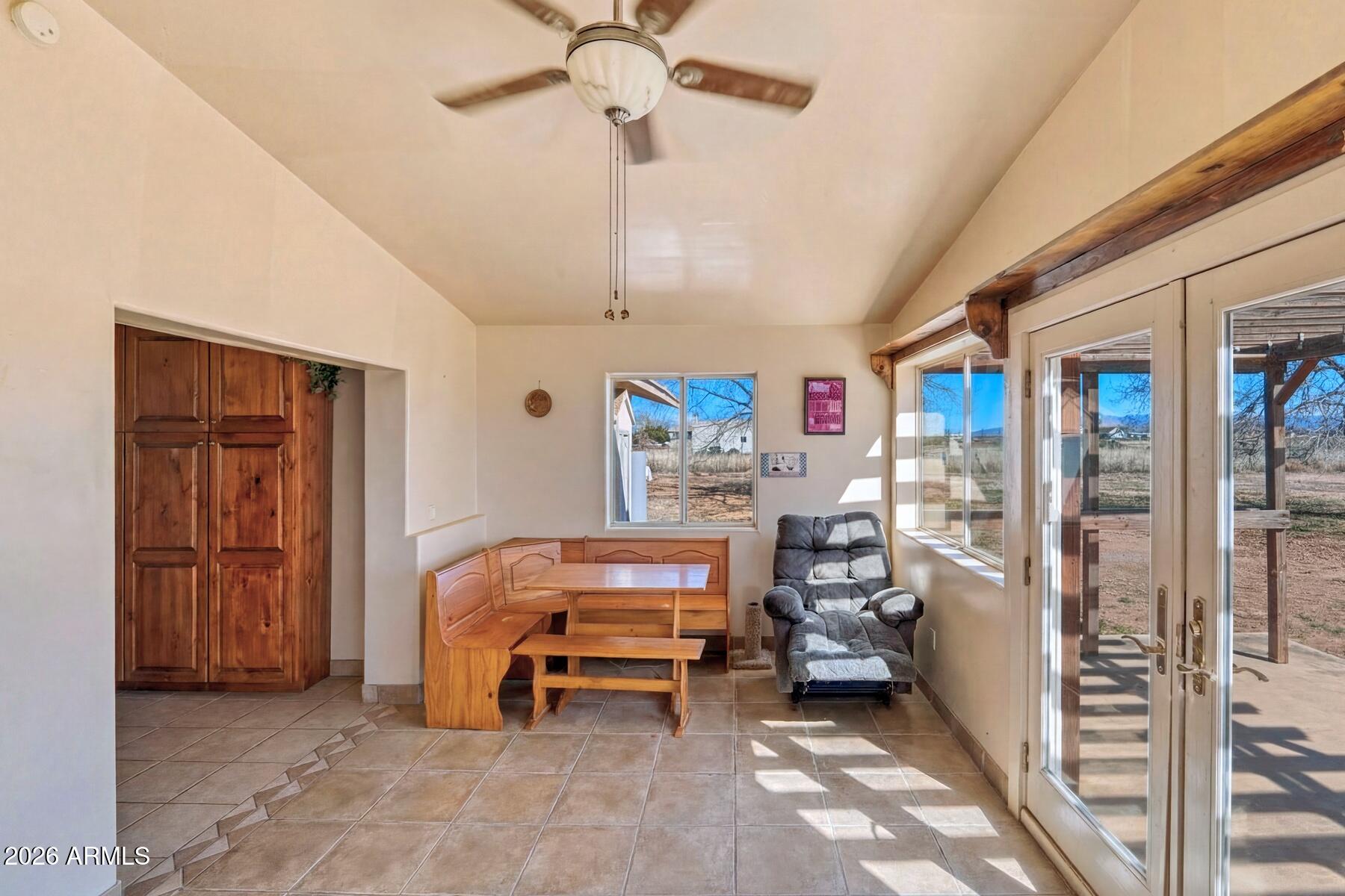 7027 North Bond Road McNeal, AZ 85617 - Photo 9 of 20 a bedroom with furniture and a ceiling fan