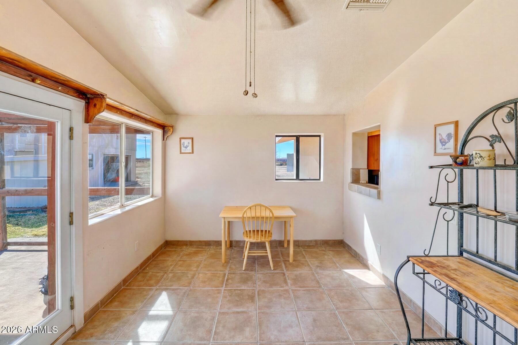 7027 North Bond Road McNeal, AZ 85617 - Photo 10 of 20 a room with furniture and baby crib