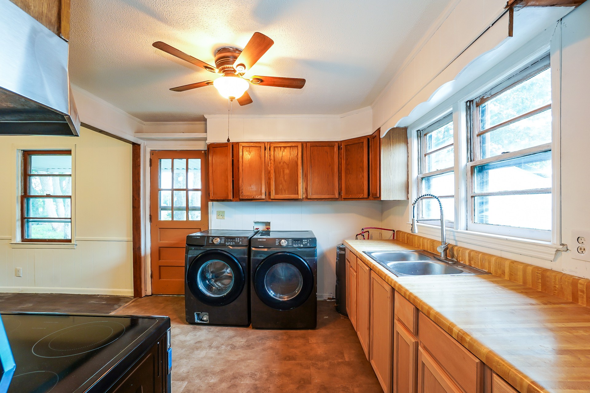 231 Foston Chapel Road Hopkinsville, KY 42240 - Photo 11 of 20 a kitchen with a refrigerator a stove and a sink
