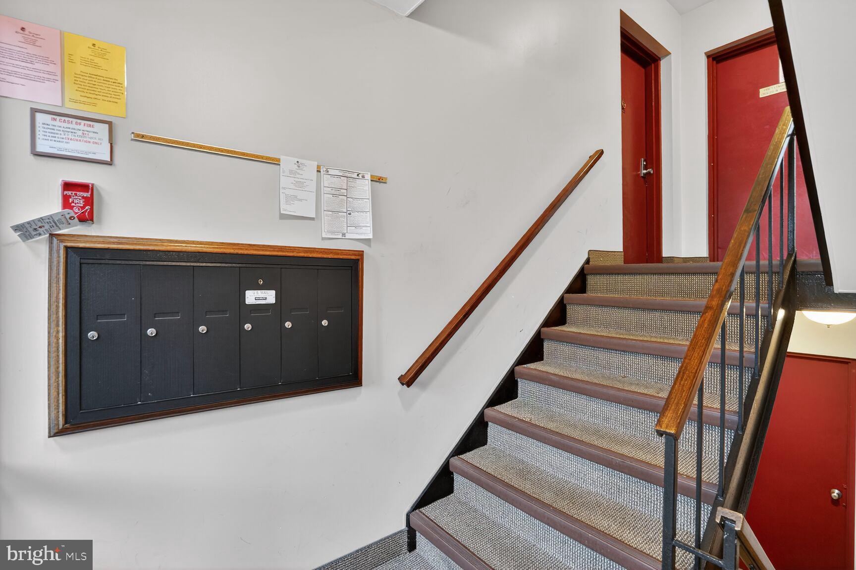2018 Colts Neck Road, Unit 10/11B Reston, VA 20191 - Photo 2 of 32 Building Entrance Hallway