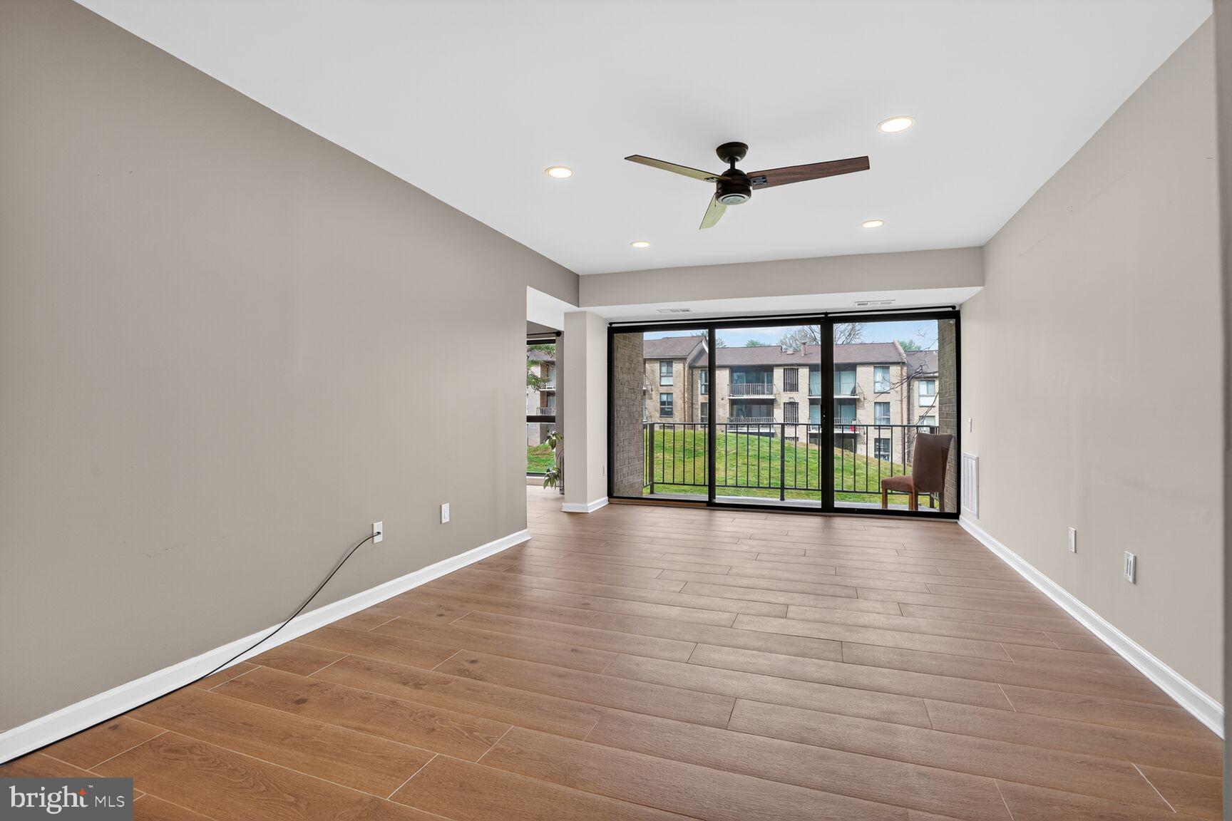 2018 Colts Neck Road, Unit 10/11B Reston, VA 20191 - Photo 4 of 32 Light Filled Living Room Picture #!
