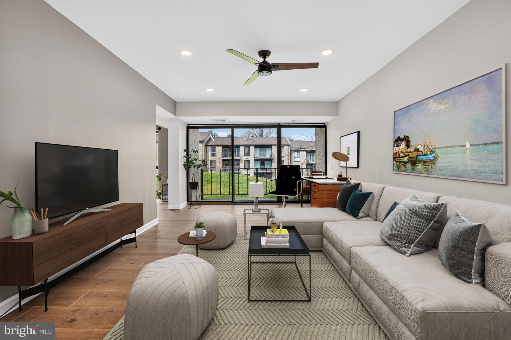 2018 Colts Neck Road, Unit 10/11B Reston, VA 20191 - Photo 5 of 32 Virtually Staged Living Room