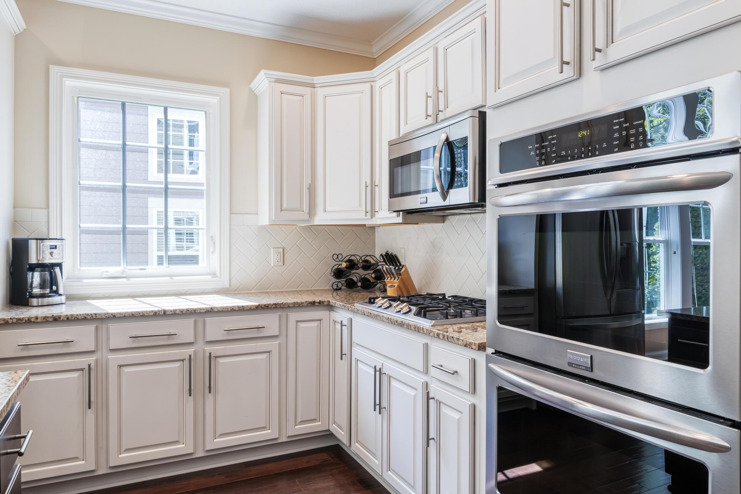 6731 Winemack Loop Dublin, OH 43016 - Photo 9 of 42 Upgraded kitchen with gas range & double oven.