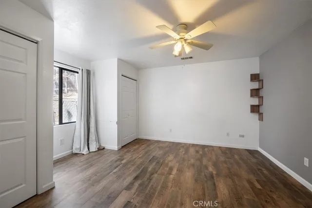 a view of backyard with a patio and outdoor seating