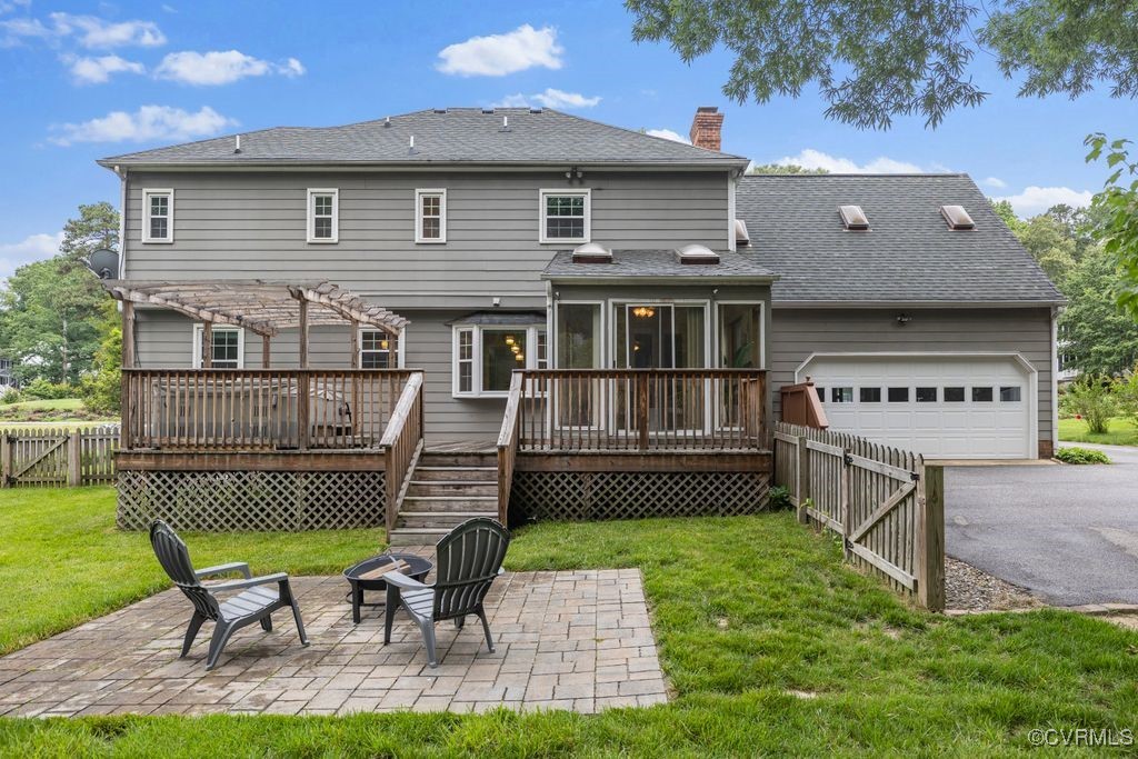 717 Shadowhill Court Midlothian, VA 23114 - Photo 33 of 44 a front view of a house with a yard table and chairs
