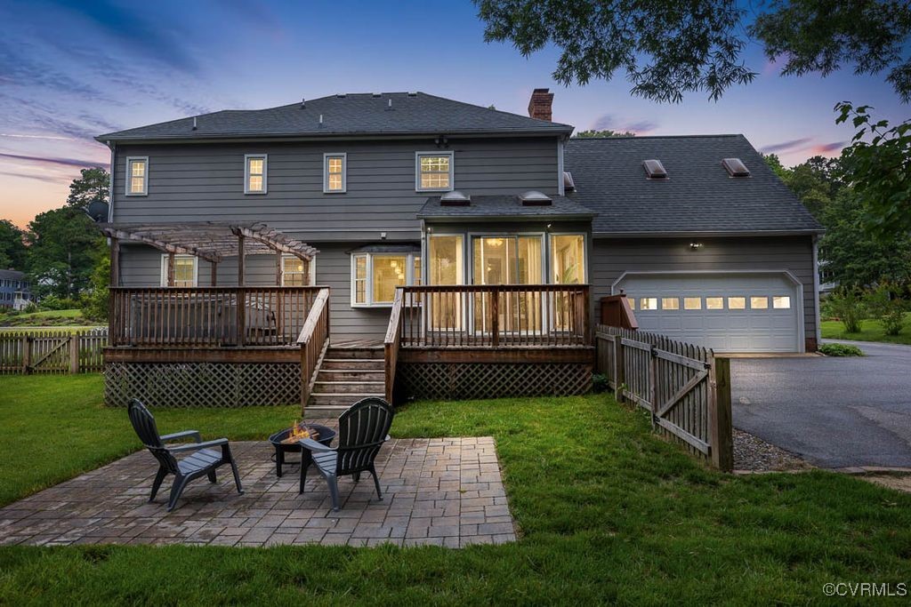 717 Shadowhill Court Midlothian, VA 23114 - Photo 37 of 44 a front view of a house with a yard table and chairs