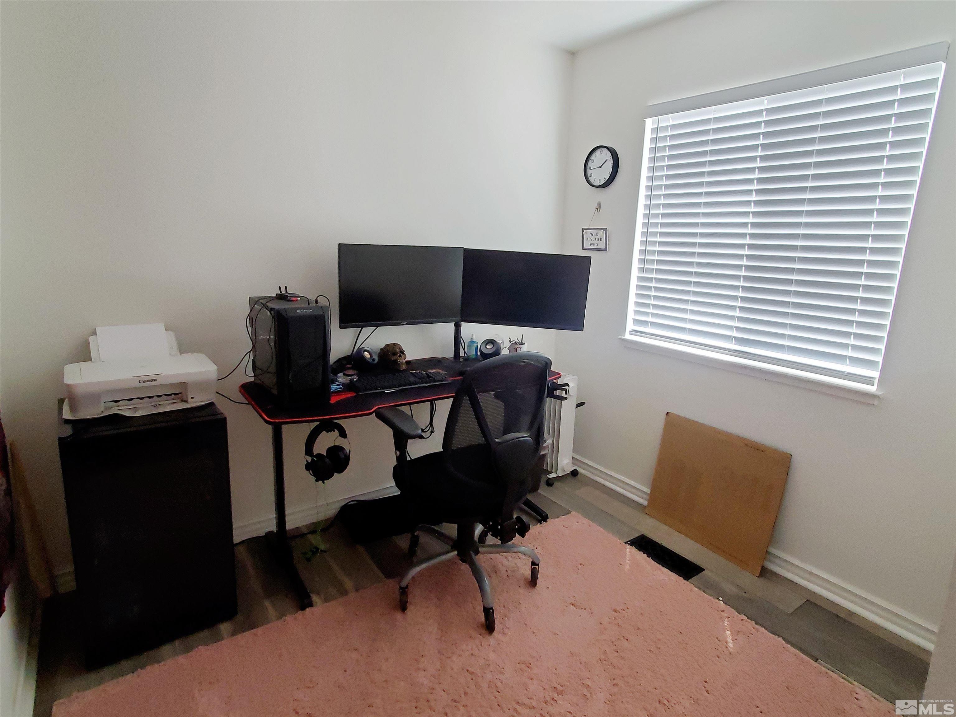 13590 Mt Olympus Street Reno, NV 89506 - Photo 8 of 17 a view of a workspace with furniture and a window