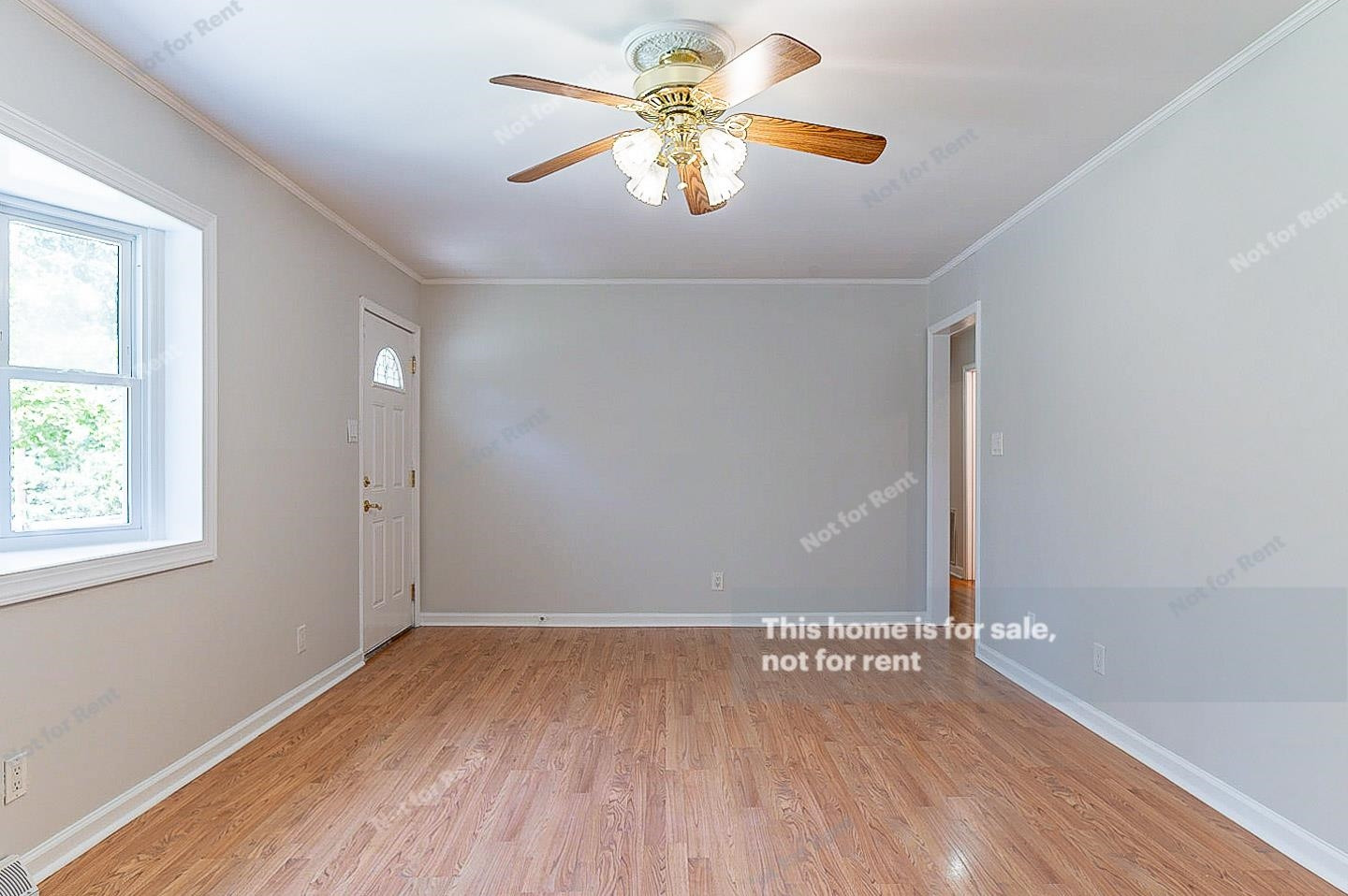 2612 Joyner Road Durham, NC 27704 - Photo 12 of 25 wooden floor in an empty room with a window