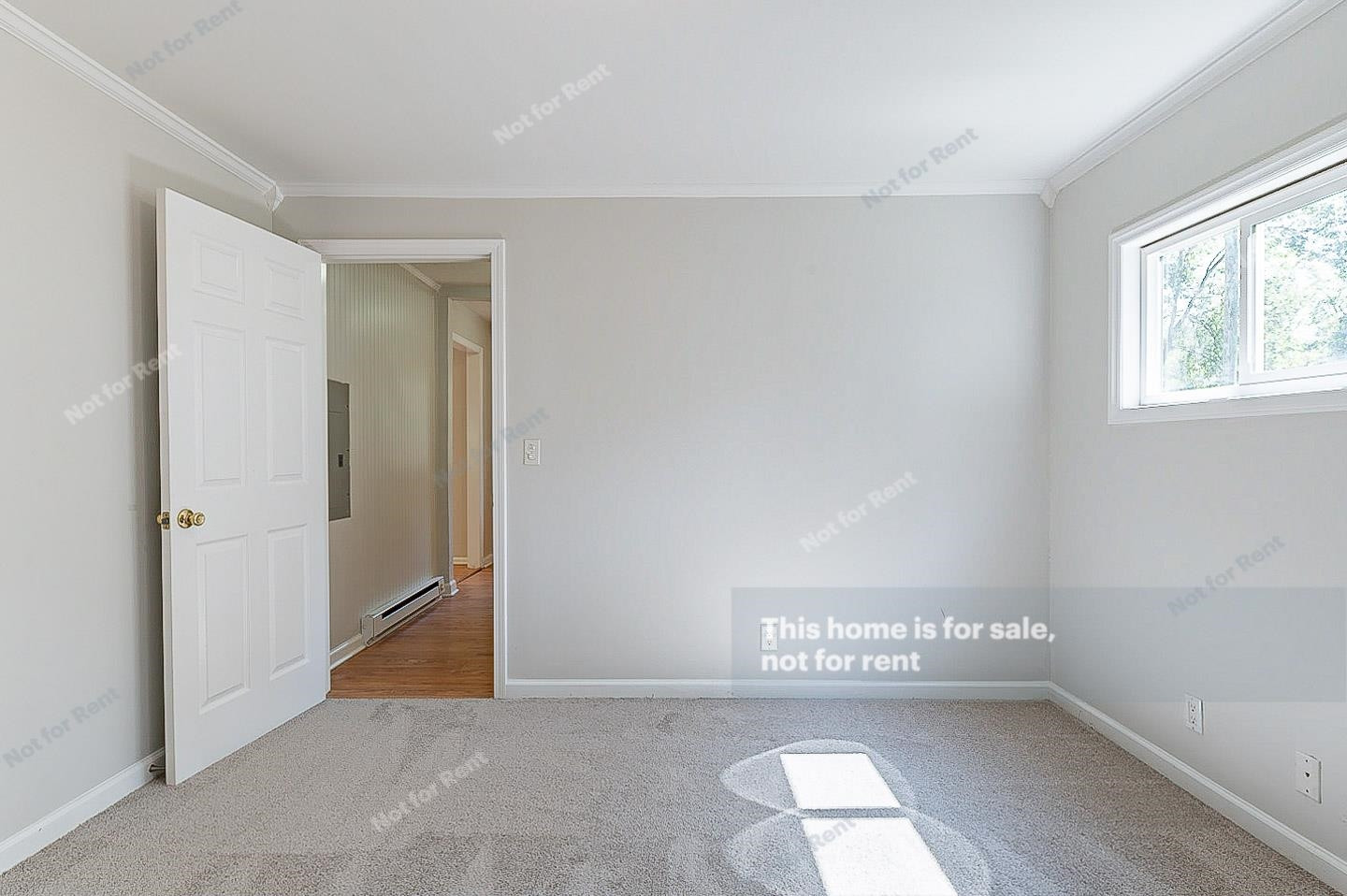 2612 Joyner Road Durham, NC 27704 - Photo 22 of 25 an empty room with windows