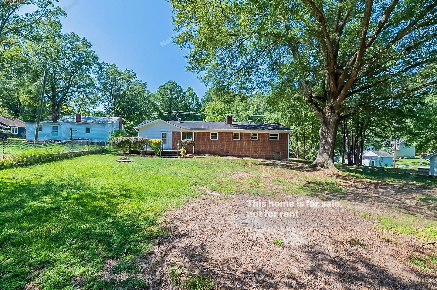 2612 Joyner Road Durham, NC 27704 - Photo 8 of 25 a view of a house with backyard and tree s