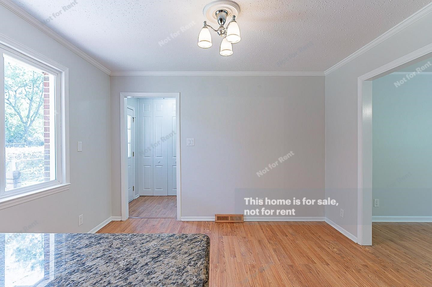 2612 Joyner Road Durham, NC 27704 - Photo 10 of 25 a view of livingroom with hardwood floor and hallway