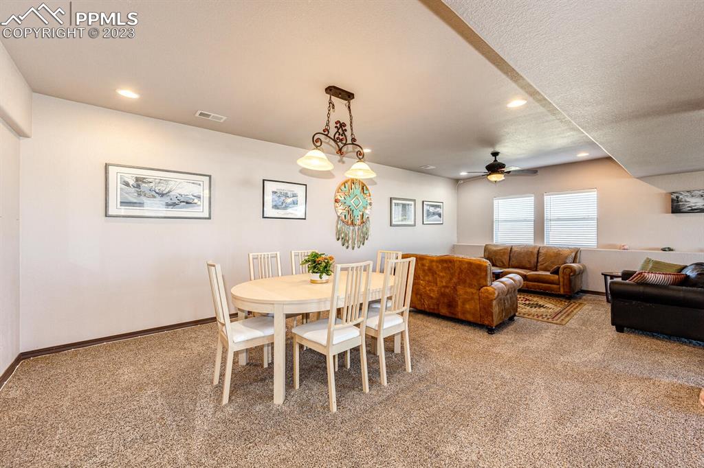 4685 County Road 106 Elbert, CO 80106 - Photo 29 of 43 a dining room with furniture and window