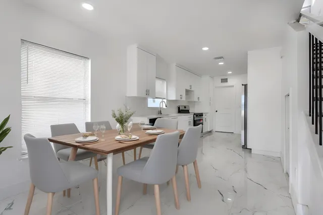 a view of a dining room with furniture