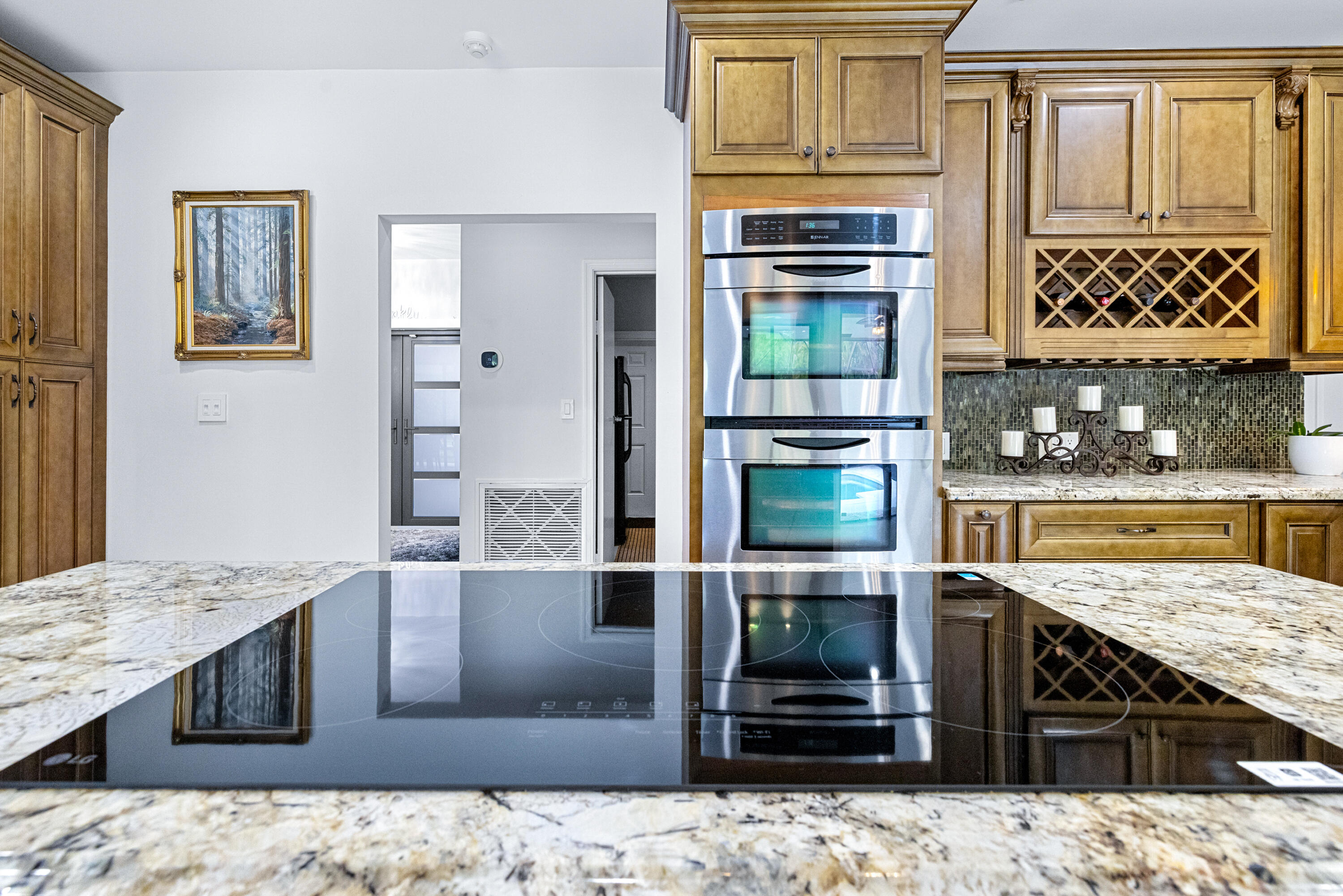 11415 Sundance Lane Boca Raton, FL 33428 - Photo 12 of 65 a living room with stainless steel appliances kitchen island granite countertop a stove and cabinets