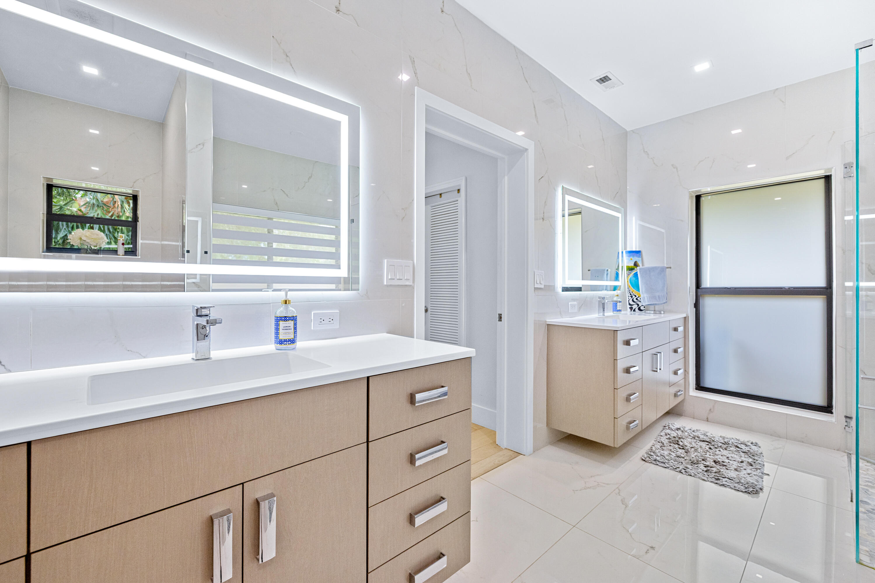 11415 Sundance Lane Boca Raton, FL 33428 - Photo 22 of 65 a kitchen with a refrigerator and a sink