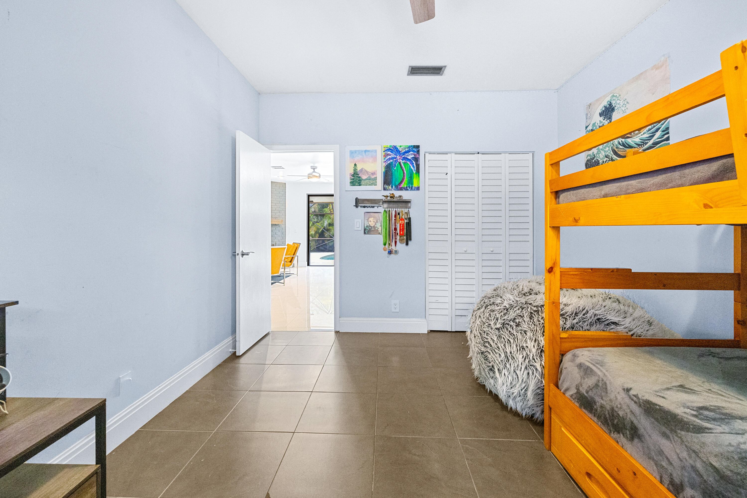 11415 Sundance Lane Boca Raton, FL 33428 - Photo 28 of 65 a bedroom with a bed and a window
