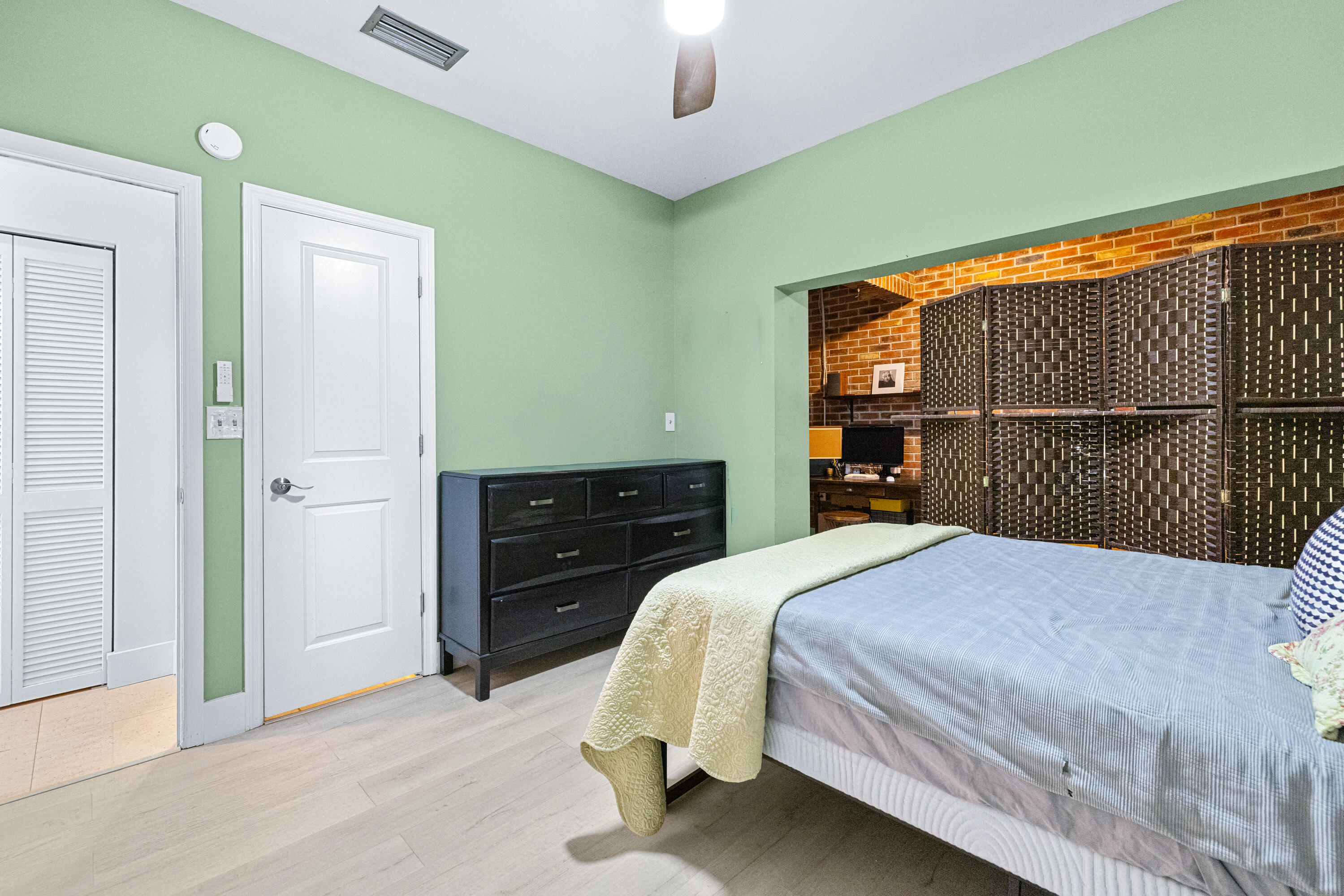 11415 Sundance Lane Boca Raton, FL 33428 - Photo 31 of 65 a bedroom with a bed and a dresser