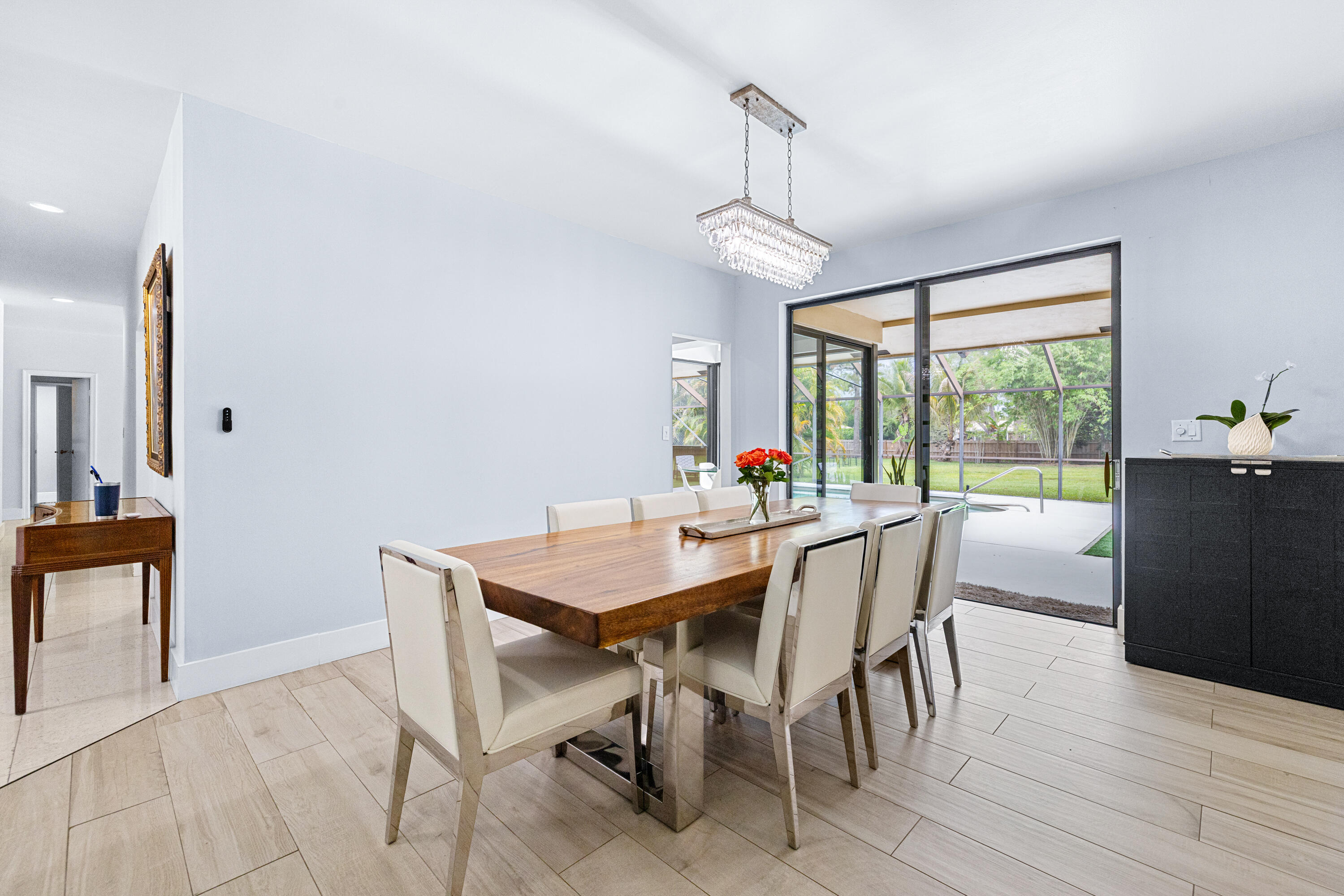 11415 Sundance Lane Boca Raton, FL 33428 - Photo 6 of 65 a view of a dining room with furniture window and wooden floor