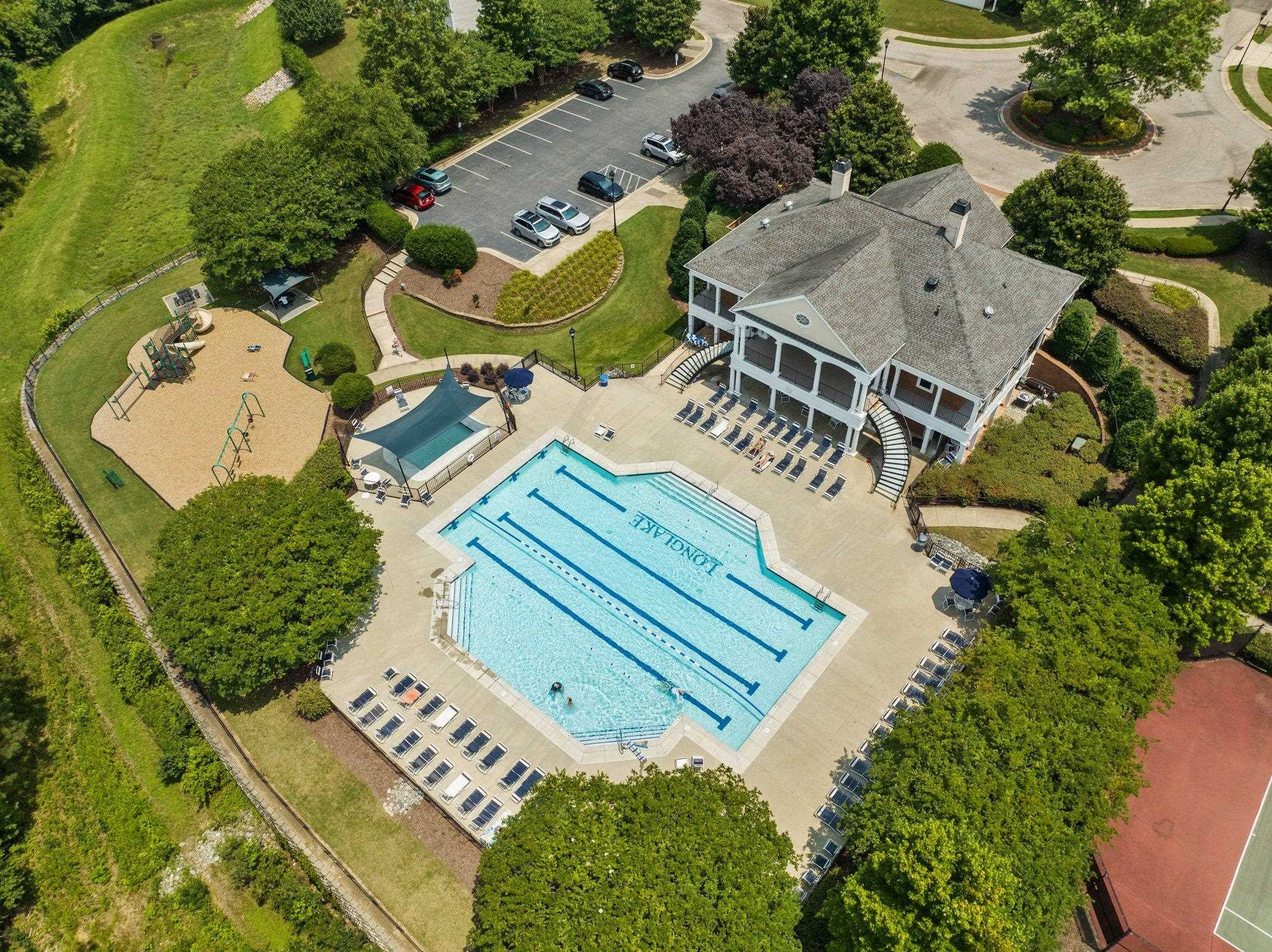 7509 Silver View Lane Raleigh, NC 27613 - Photo 37 of 39 Enjoy the Neighborhood Community Pool and Clubhouse. Community Pool and Clubhouse