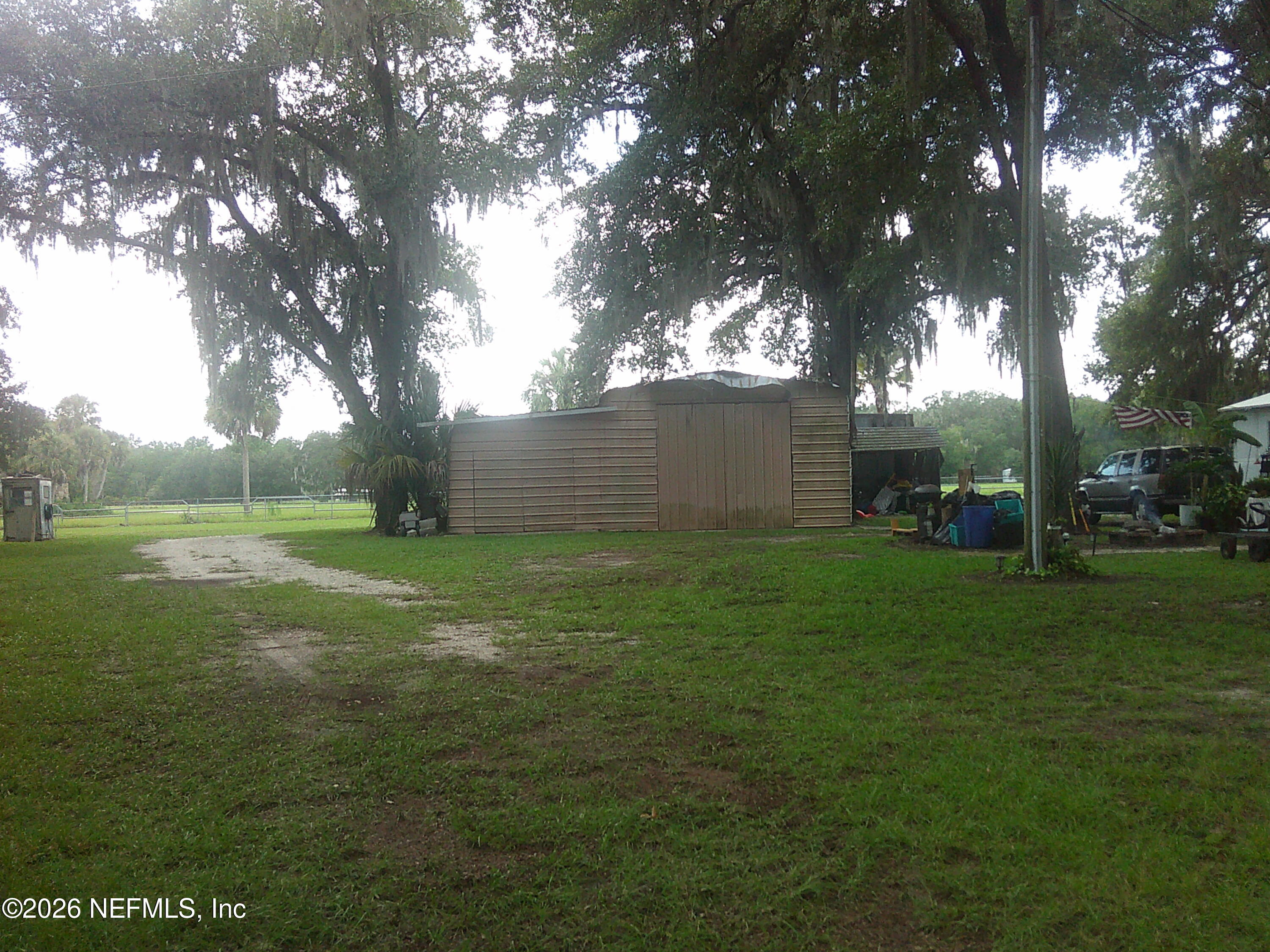 131 Pomona Landing Road Pomona Park, FL 32112 - Photo 4 of 19 a view of a backyard