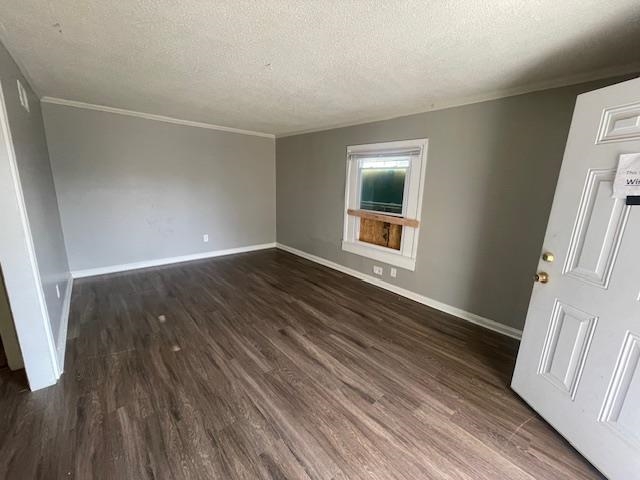770 Waring Road Memphis, TN 38122 - Photo 2 of 12 a view of an empty room with wooden floor and a window