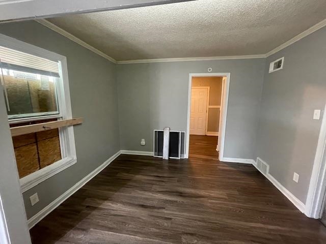 770 Waring Road Memphis, TN 38122 - Photo 4 of 12 a view of an empty room with wooden floor and a window