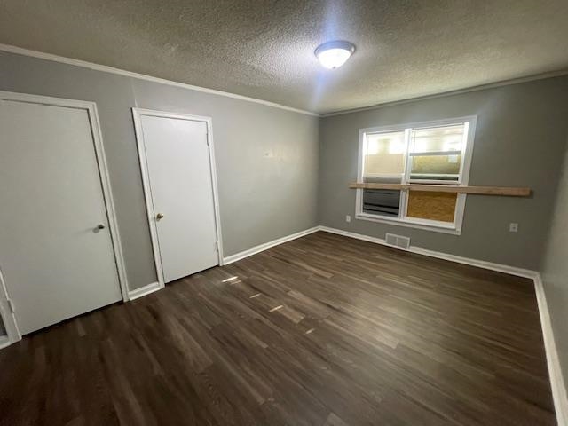 770 Waring Road Memphis, TN 38122 - Photo 8 of 12 an empty room with wooden floor and windows