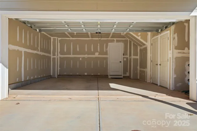 a view of building with car parked