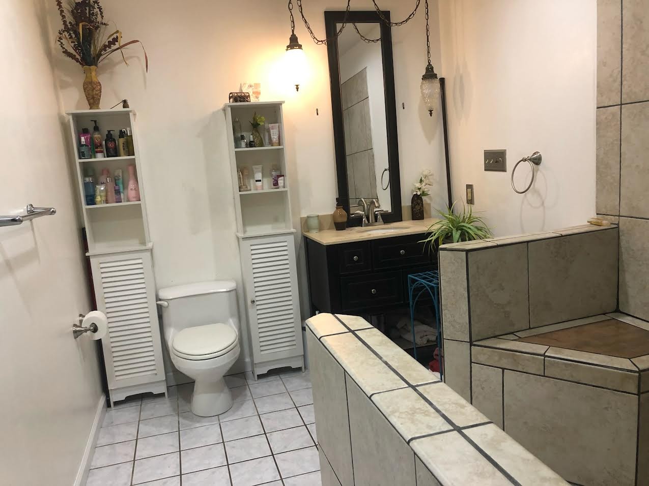 395 Hannis Road Bolivar, TN 38008 - Photo 7 of 24 a bathroom with a toilet sink and mirror