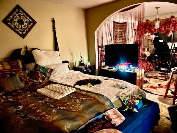 a workspace with furniture and a window