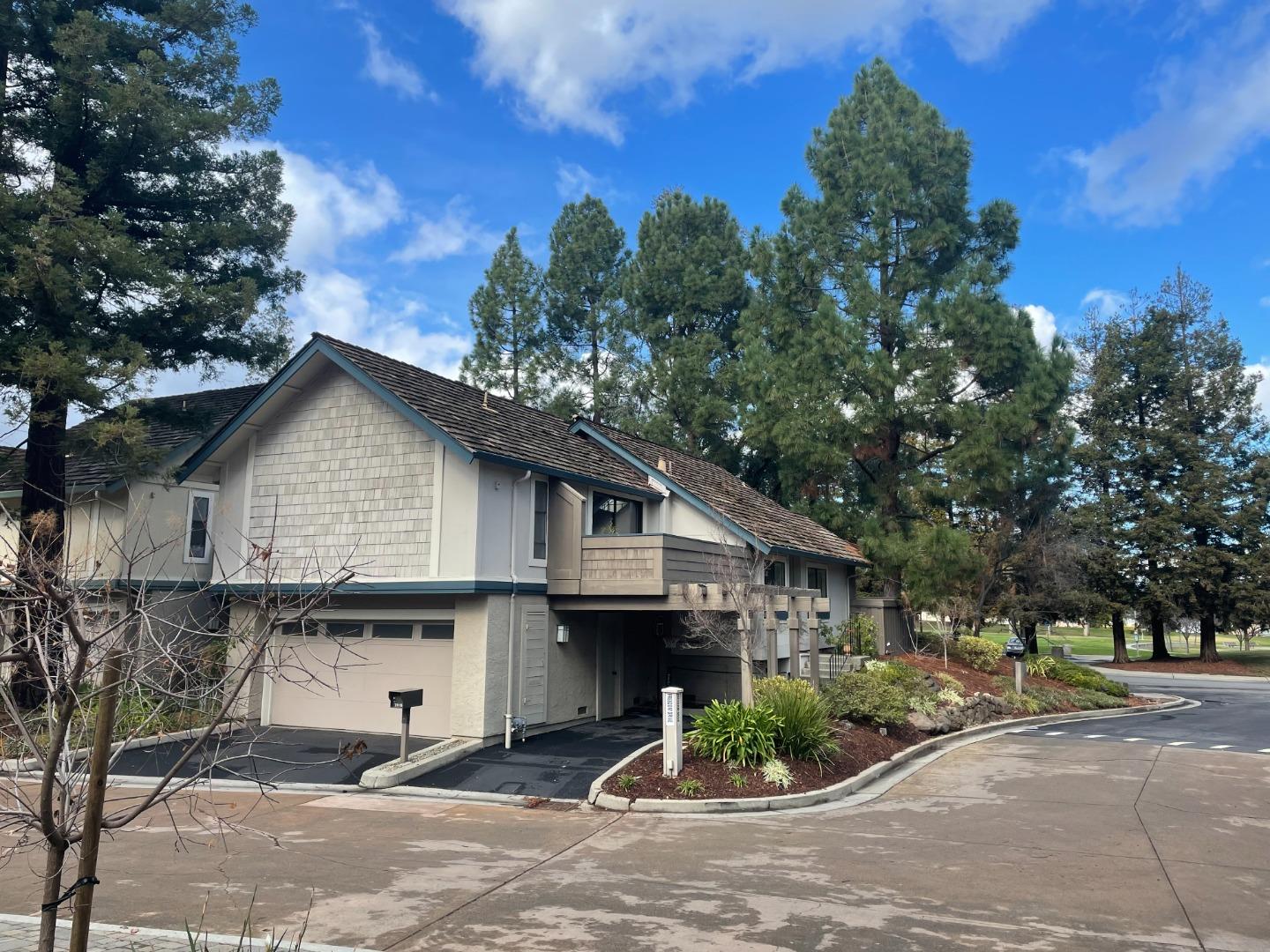21115 Freedom Drive Cupertino, CA 95014 - Photo 1 of 1 a front view of a house with garden