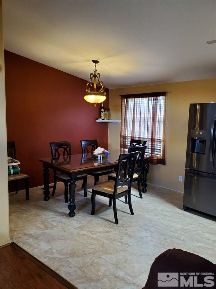 1337 Lynx Street Reno, NV 89506 - Photo 6 of 20 a view of a dining room with furniture