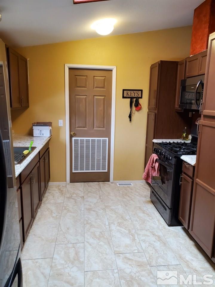 1337 Lynx Street Reno, NV 89506 - Photo 7 of 20 a view of a storage & utility room