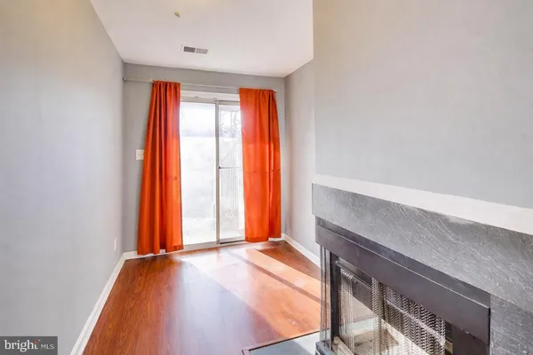 a view of an empty room and window