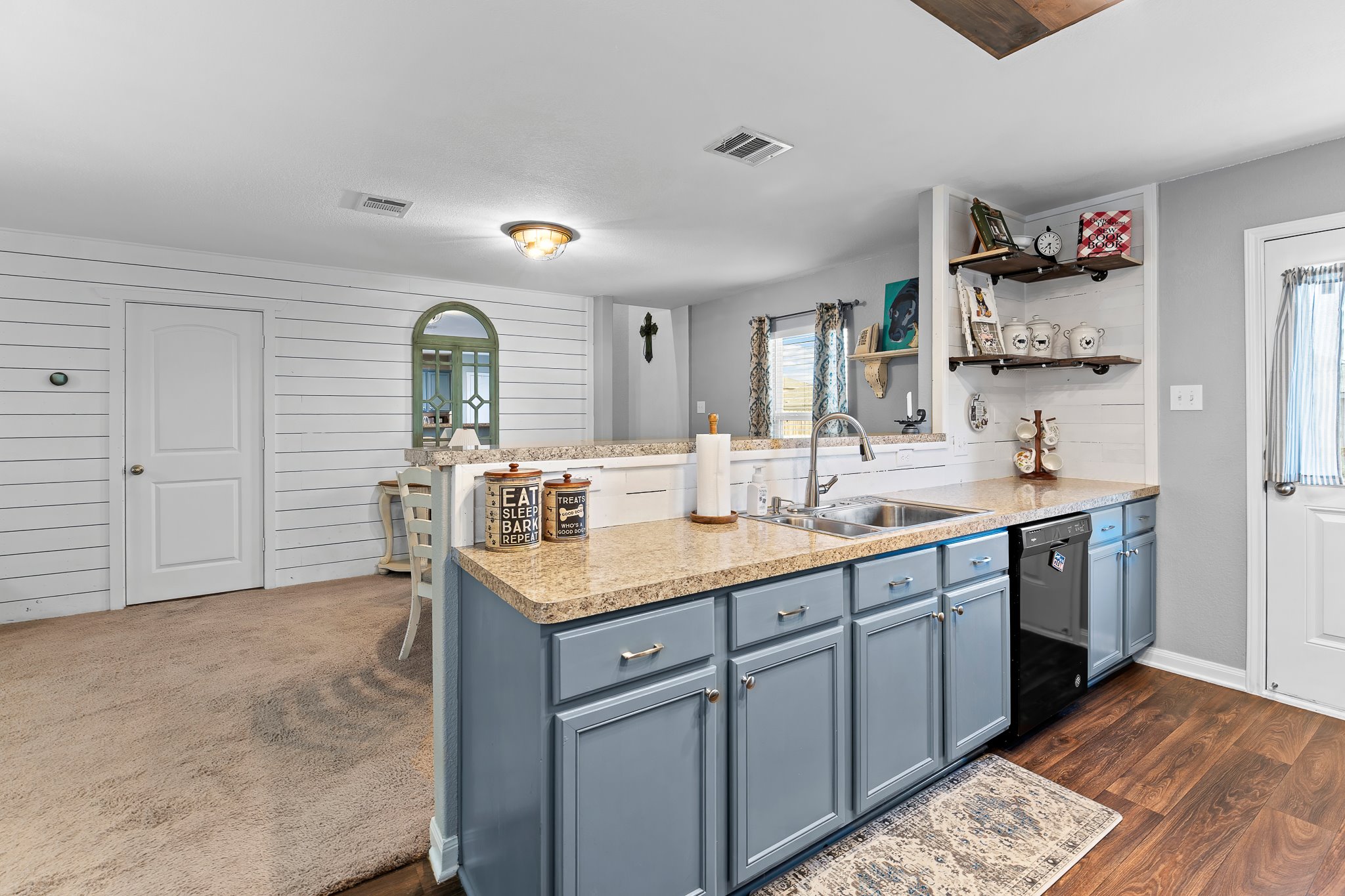 100 Wincliff Cove, Unit 13D Jarrell, TX 76537 - Photo 13 of 40 a bathroom with a sink and a mirror