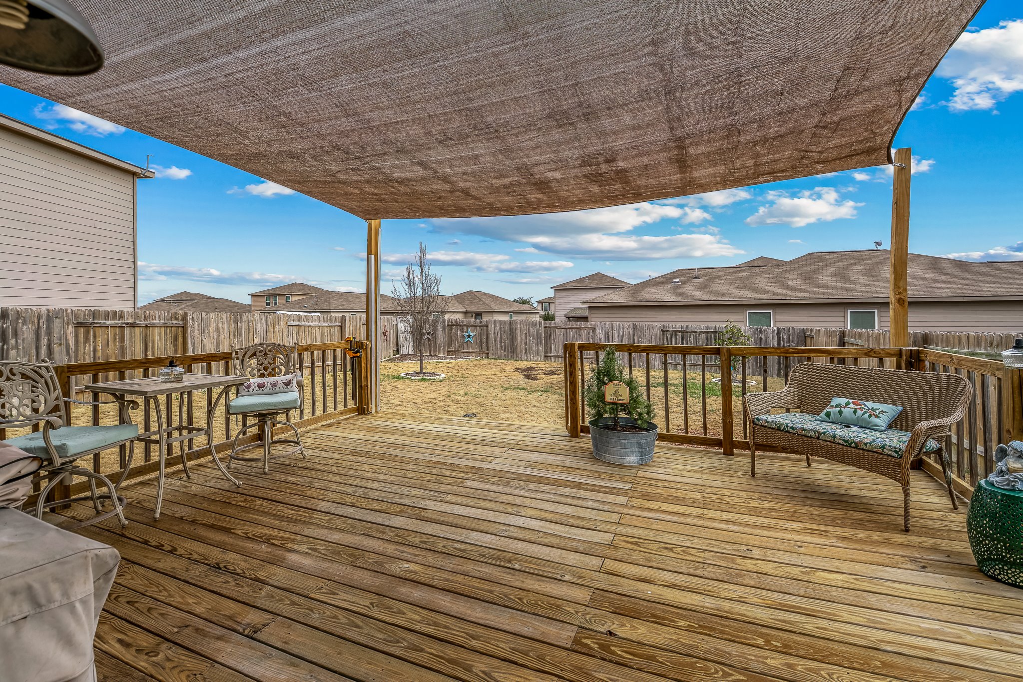 100 Wincliff Cove, Unit 13D Jarrell, TX 76537 - Photo 27 of 40 a view of a balcony with wooden floor