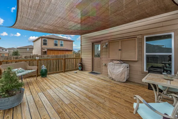 a living room with furniture and a clock