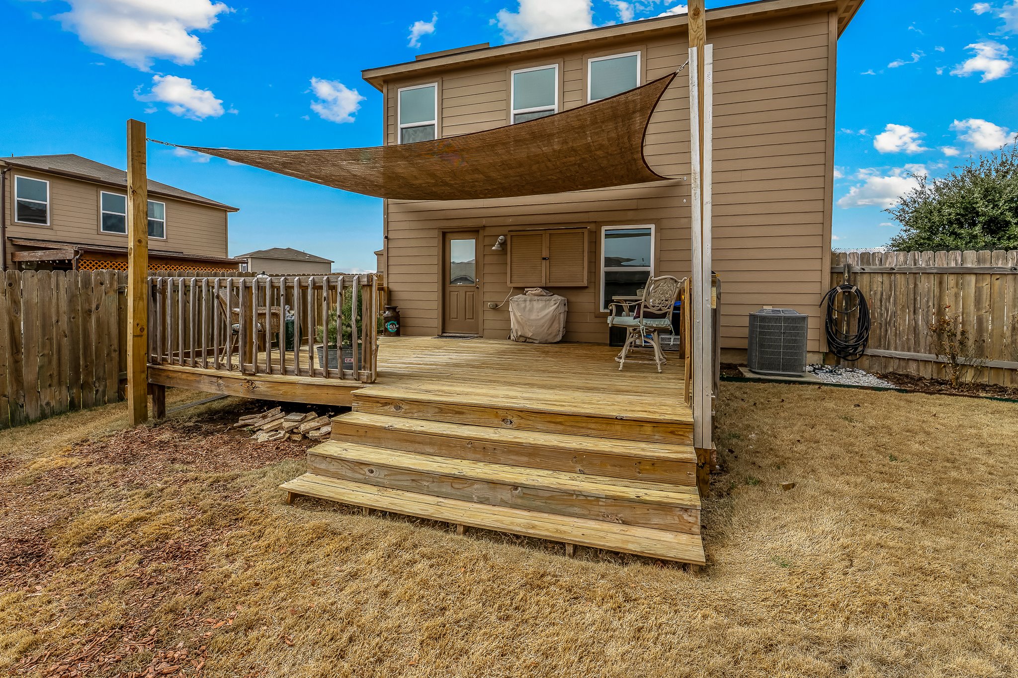 100 Wincliff Cove, Unit 13D Jarrell, TX 76537 - Photo 3 of 40 a view of a house with a patio