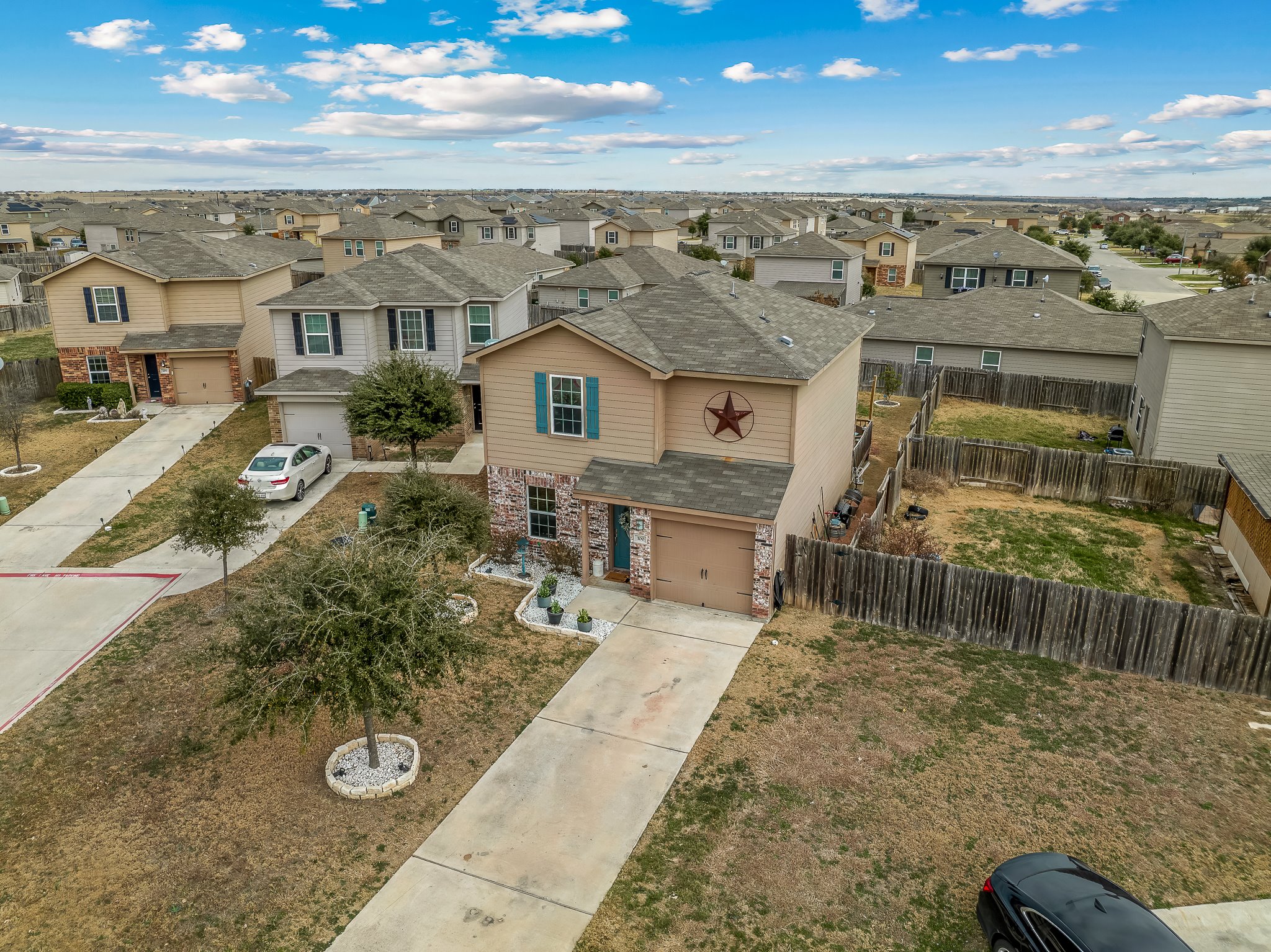 100 Wincliff Cove, Unit 13D Jarrell, TX 76537 - Photo 33 of 40 an aerial view of a house with a yard