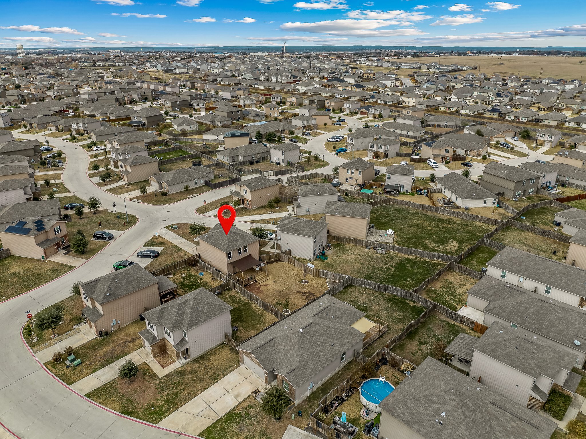 100 Wincliff Cove, Unit 13D Jarrell, TX 76537 - Photo 36 of 40 an aerial view of a house with a yard