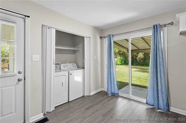 a room that has a bed and a window