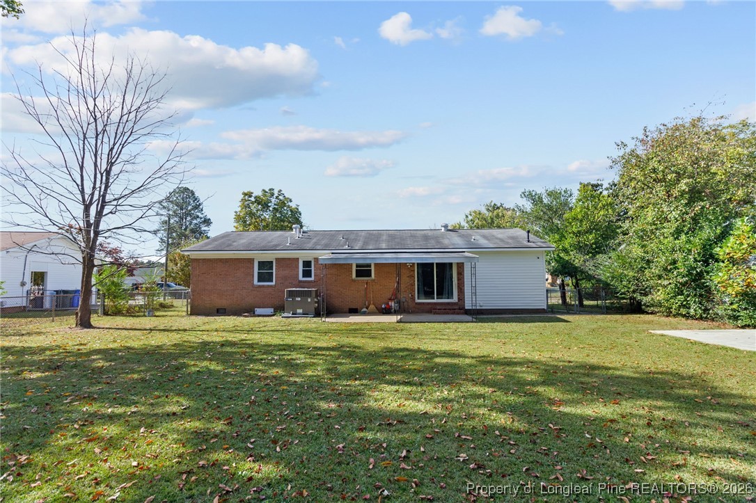 5414 Plateau Road Fayetteville, NC 28303 - Photo 26 of 27 a view of a house with a yard