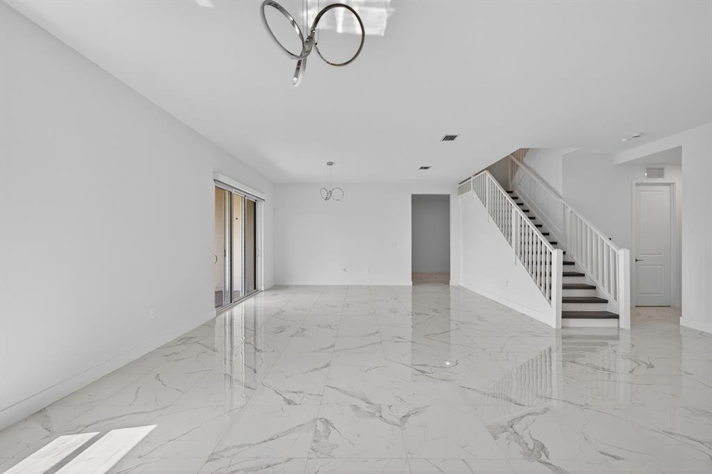 4421 Southwest 123rd Avenue Davie, FL 33330 - Photo 16 of 62 a view of an entryway with wooden floor